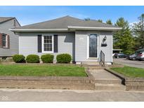 Charming home featuring well-maintained landscaping and a classic exterior at 844 Blanchard St, Shelbyville, IN 46176