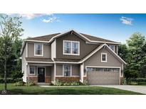 Charming two-story home with a two-car garage, landscaped yard, and inviting entrance at 7230 Estes Dr, Indianapolis, IN 46239