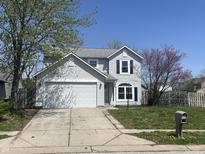 Charming two-story home with a two car garage, lovely landscaping and a beautiful yard at 11152 Dura Dr, Indianapolis, IN 46229