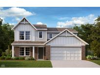 Charming two-story home with brick accents, white siding, and a welcoming front porch at 792 Oakleaf Dr, Greenfield, IN 46140