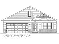 Charming single-story home with a two-car garage and covered front entry at 1644 Winn Ct, Fortville, IN 46040