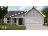 Charming single-story home featuring a gray and white color scheme, a covered entry, and an attached two-car garage at 778 Oakleaf Dr, Greenfield, IN 46140