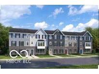 Inviting townhomes featuring distinct color schemes, complementary shutters, and manicured landscaping at 4144 Cupertino Ave # 38F, Plainfield, IN 46168