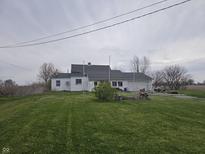 Charming single-story home with green lawn at 1152 W 375 N, Anderson, IN 46011