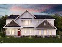 Charming two-story home with red front door, stone accents, and lush green lawn at 6217 Hampton Walk Blvd, McCordsville, IN 46055