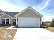Charming one-story home with neutral siding and a spacious two-car garage at 19602 Atwater Ave, Sheridan, IN 46069