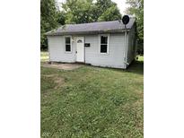 Charming single-story home with a well-maintained lawn and inviting front entrance at 2413 N Macedonia Ave, Muncie, IN 47303