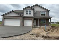 Charming two-story home with a two car garage, set on a spacious lot at 196 Aster Way, Greenfield, IN 46140