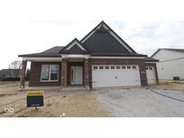 Beautiful single-story brick home with a two-car garage and covered porch at 5052 Carmine St, Brownsburg, IN 46112