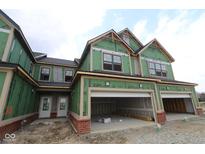 New construction with a brick-accented garage and Zip System sheathing, offering modern curb appeal at 17458 Ebling Trl, Westfield, IN 46062