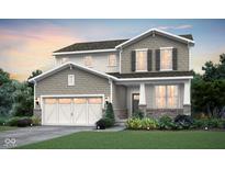 Charming two-story home featuring a two-car garage and beautifully landscaped front yard at 6801 Seabiscuit Rd, Whitestown, IN 46075