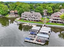 Waterfront townhomes feature private boat docks and lovely green spaces, perfect for lakeside living and enjoyment at 3646 Beach Blvd, Cicero, IN 46034