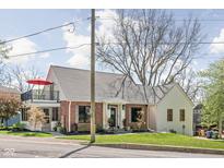 Charming brick home with balcony and landscaped yard in a desirable neighborhood at 775 W Hawthorne St, Zionsville, IN 46077