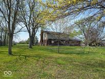 Beautiful home with a large yard and mature trees at 798 S 600 W, New Palestine, IN 46163