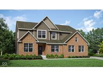 New two story home displaying beautiful brick and siding, professionally landscaped at 9149 Rockville Pl, McCordsville, IN 46055