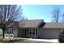 Charming single-story home featuring a well-maintained yard and attached two-car garage, providing comfort and convenience at 4036 Fairoaks Ct, Franklin, IN 46131