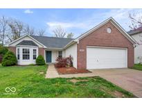 Charming single-story home with brick and vinyl siding and an attached two-car garage at 19516 Golden Meadow Way, Noblesville, IN 46060