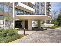 Elegant entrance to the Barkington Tower with stone and modern architectural details at 4000 N Meridian St # Apt 15J, Indianapolis, IN 46208