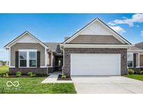Charming, single-story home with a brick facade, attached garage, and well-manicured lawn in a suburban neighborhood at 2257 Aviary Ln, Danville, IN 46122