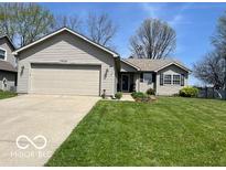 Charming home with manicured front yard, inviting curb appeal at 1502 Austin Dr, Lebanon, IN 46052