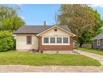 Charming single-Gathering home featuring a well-maintained lawn and classic architectural details at 480 E Walnut St, Martinsville, IN 46151