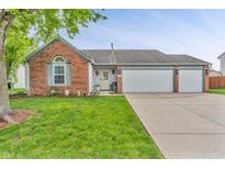 Charming single-Gathering home with a well-manicured lawn and a spacious three-car garage at 8375 Eagles Nest Dr, Avon, IN 46123