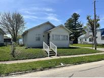 Charming single-Gathering home with a well-maintained lawn and cozy curb appeal at 1203 E 27Th St, Anderson, IN 46016