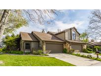 Charming townhouse with a well-manicured lawn and a two-car garage, perfect for comfortable living at 2236 Calaveras Way, Indianapolis, IN 46240