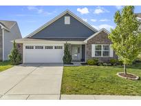 Charming single-Gathering home with a manicured lawn, a two-car garage, and a welcoming front porch at 5465 Tanglewood Ln, Whitestown, IN 46075