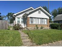 Inviting single-Gathering home with a brick foundation and a well-maintained front lawn at 1622 S Randolph St, Indianapolis, IN 46203