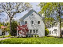 Charming home showcasing a manicured lawn and delightful curb appeal at 4134 N Pennsylvania St, Indianapolis, IN 46205