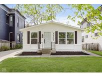 Charming renovated home boasts updated landscaping and a freshly painted exterior at 1906 N Park Ave, Indianapolis, IN 46202