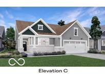 Charming single-Gathering home with white brick accents, gray siding, and a well-manicured lawn at 5291 Nettleton Way, Avon, IN 46123