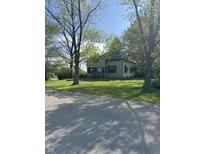 Quaint single-Gathering home with green lawn and shade trees at 255 S 900 E, Zionsville, IN 46077