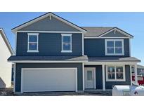 New construction two-story home features blue siding, white trim, attached two-car garage and covered porch at 9107 Steinbeck Ln, Indianapolis, IN 46239