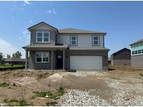 New construction two-story home with a neutral color scheme, a two-car garage, and professional landscaping at 50 Benfield Dr, Whiteland, IN 46184