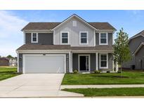 Charming two-story home with attached two car garage and well-manicured lawn at 10126 Redwood Peak Ln, Indianapolis, IN 46259