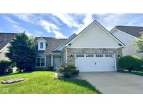 Charming single-Gathering home featuring a two-car garage and well-manicured lawn at 12551 Hawks Landing Dr, Fishers, IN 46037