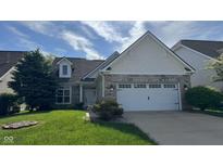 Charming home featuring a brick facade, dormer window and well-manicured front lawn at 12551 Hawks Landing Dr, Fishers, IN 46037
