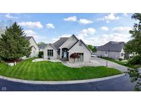 Well maintained single-Gathering home with brick exterior and inviting curb appeal at 14035 Stone Key Way, Fishers, IN 46037