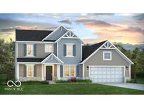 Charming two-story home with a mix of siding, shutters, and a well-manicured lawn at 700 North W, McCordsville, IN 46055