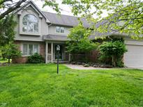 Charming two-story home featuring a well-manicured lawn and inviting front entrance at 11021 Brentwood Ave, Zionsville, IN 46077