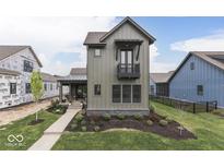 Charming craftsman-style home featuring board and batten siding and a small balcony at 17346 Newton Main St, Westfield, IN 46074