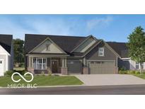 Charming single-story home featuring a covered front porch and a two-car garage on a well-manicured lawn at 5127 Foxley Park Ln, Avon, IN 46123