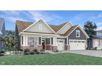 Charming single Gathering home boasts a manicured lawn, two car garage, and inviting covered front porch at 5127 Foxley Park Ln, Avon, IN 46123