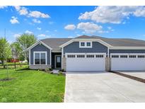 Charming single-story home featuring a two-car garage, well-manicured lawn, and attractive curb appeal at 1639 Clover Crossing Dr, Greenfield, IN 46140