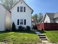Charming two-story home with red roof and a well-maintained front yard at 810 S 18 Th St, Elwood, IN 46036