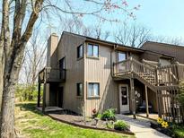 Charming townhome with a private porch and beautiful landscaping in a peaceful neighborhood at 93 Lookout Ridge Dr # 24U, Columbus, IN 47201