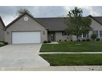 Charming single-story home featuring a well-manicured lawn, brick facade, and a two-car garage at 2635 Red Admiral Ln, Lebanon, IN 46052