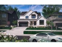Charming two-story home with a two car garage, brick accents, and a manicured lawn at 1415 Beaumont Cir, Westfield, IN 46074